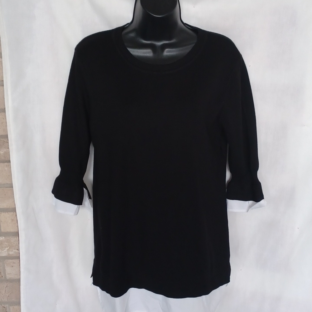Black sweater with white accents